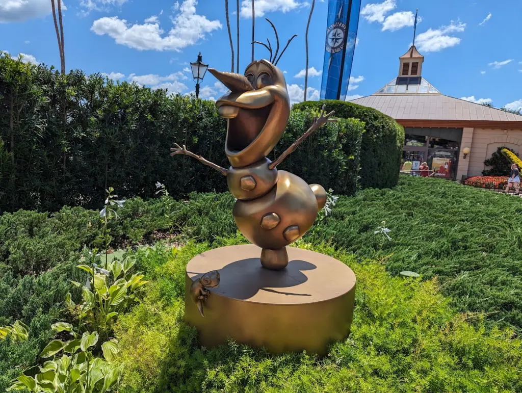 Olaf dancing statue in the summer sun at Disney World