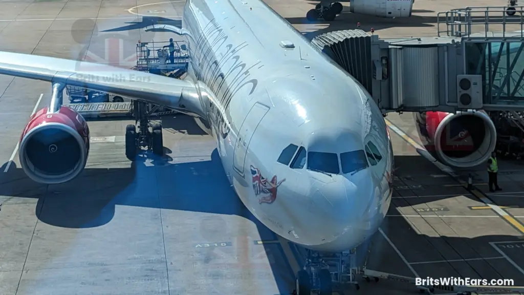 A Virgin Atlantic plane at Manchester airport waiting for passengers to load